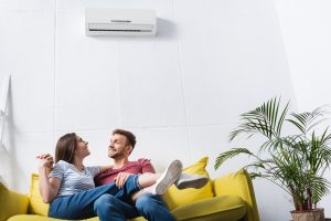 couple in living room ac
